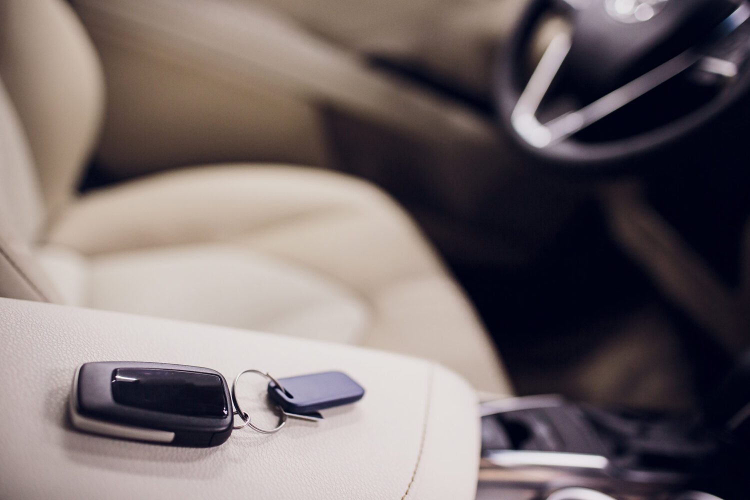 Passing car keys. Cropped closeup car dealer holding out car keys camera copyspace car dealership salon manager salesman selling buying giving owner profession purchase vehicle concept
