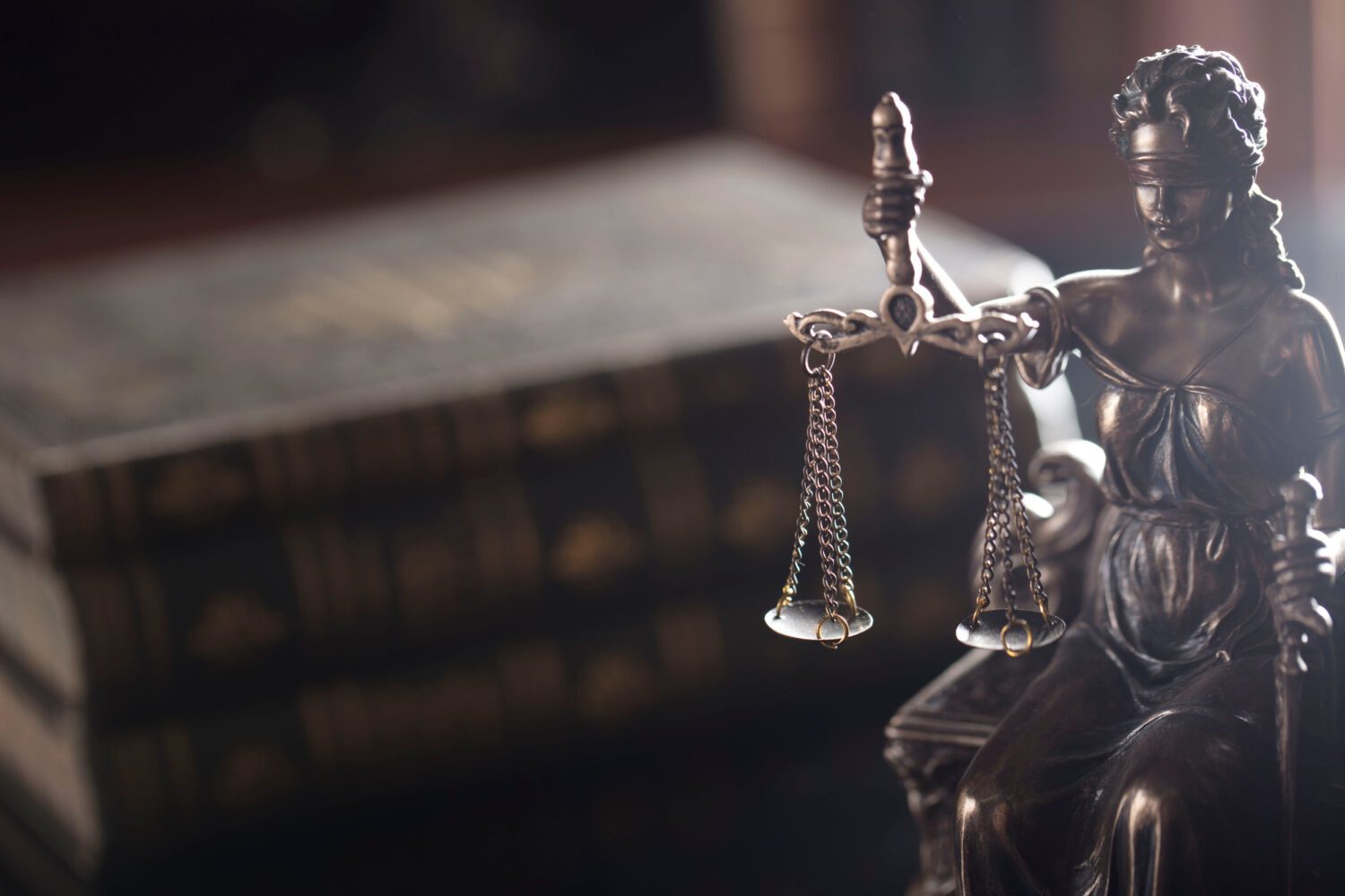 Law concept. Statue of justice in old court library.