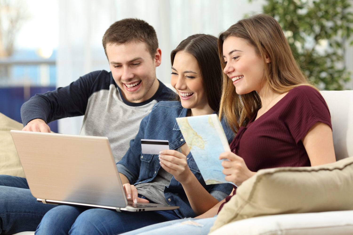 Friends planning and buying a travel on line